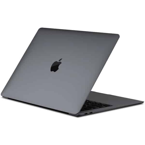 Set bagfra af en grå macbook med åben plads, der viser æblelogoet på låget og et synligt tastatur.